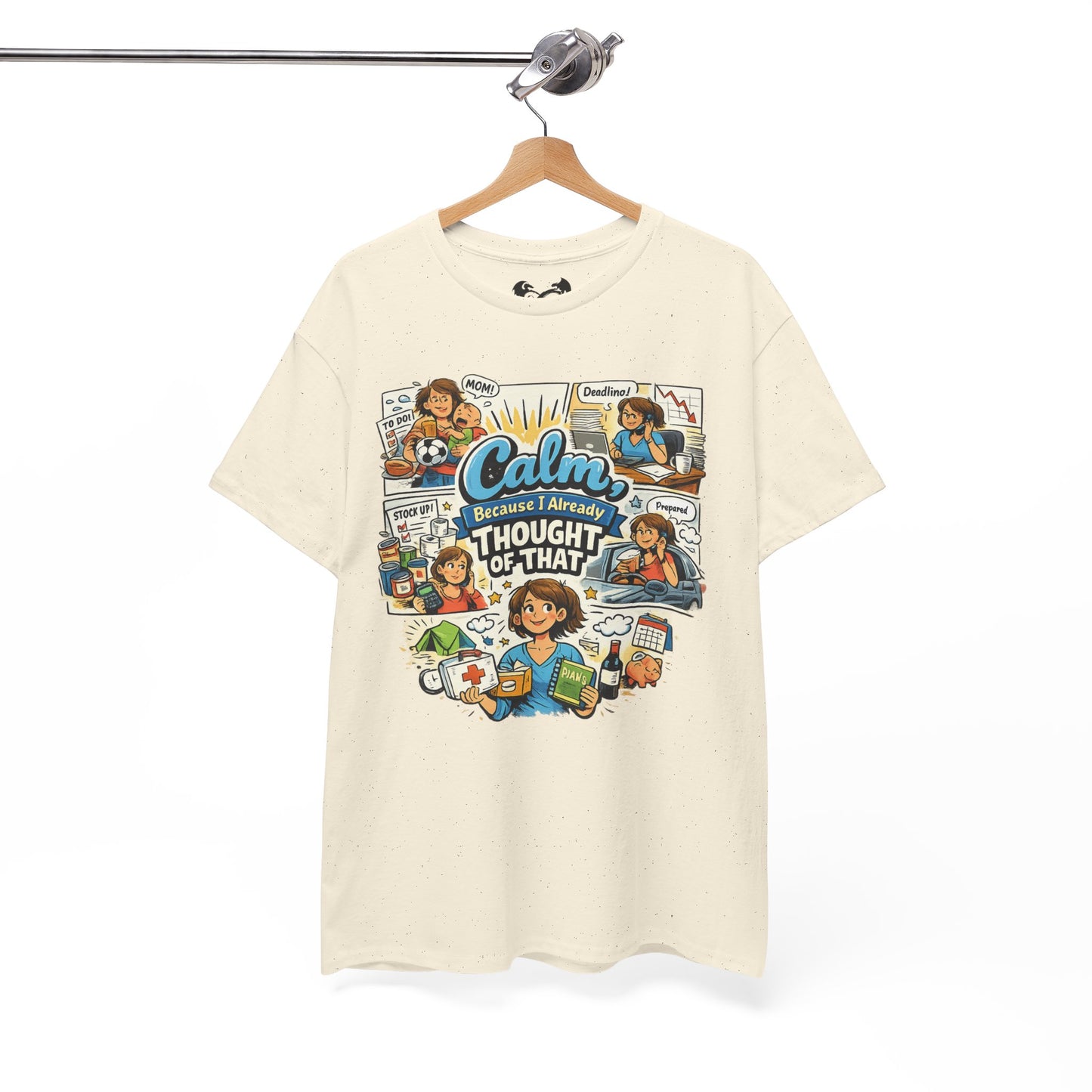 Beige t-shirt with colorful graphic design on a hanger against a white background