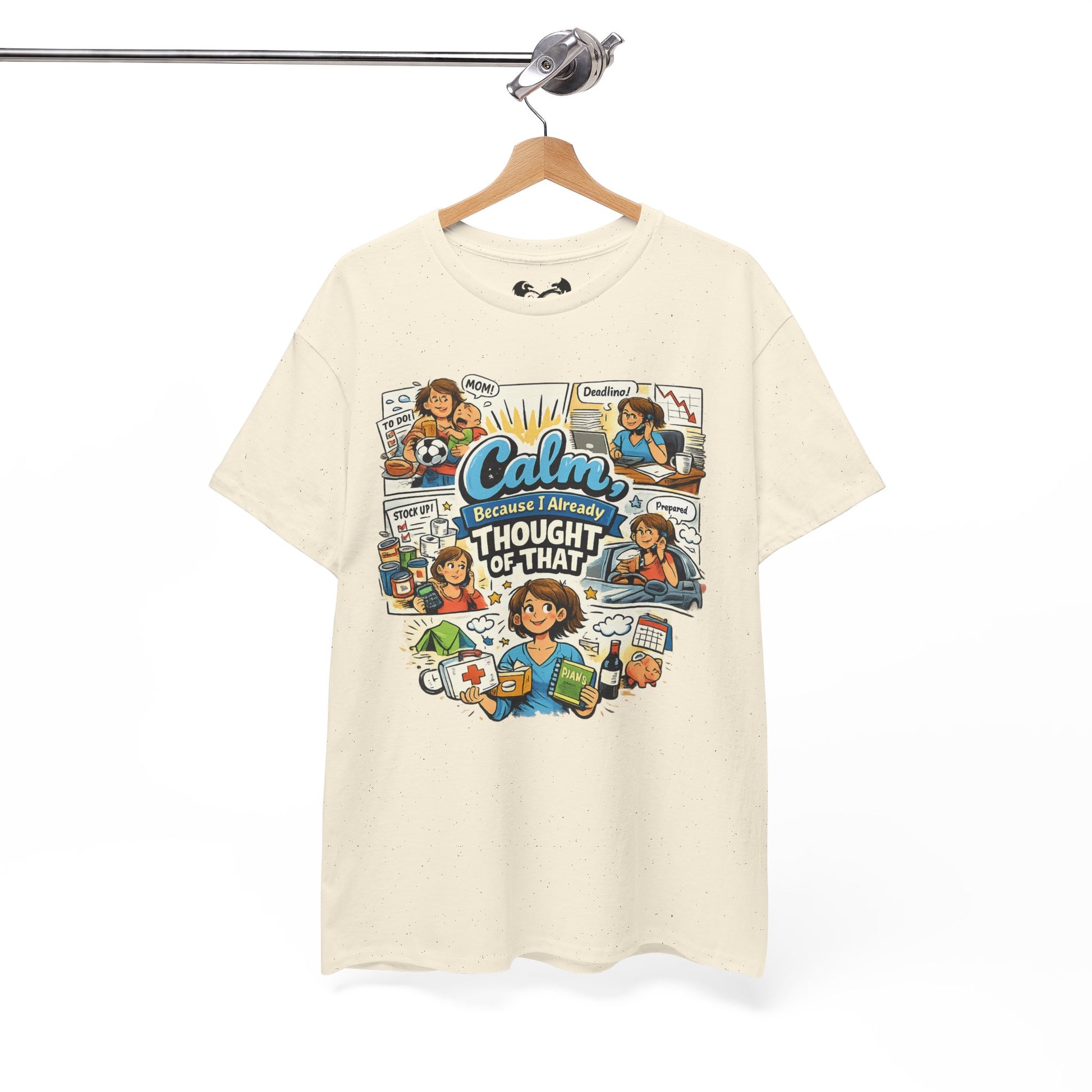 Beige t-shirt with colorful graphic design on a hanger against a white background