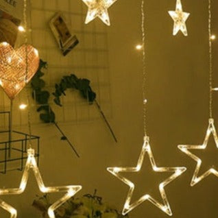 Spread some extra holiday cheer with these twinkling Star Light Christmas Decorations! The star-shaped lights are perfect for decorating your home and creating unforgettable holiday memories with their sparkling brilliance. You'll be on top of the tree with these delightful stars!