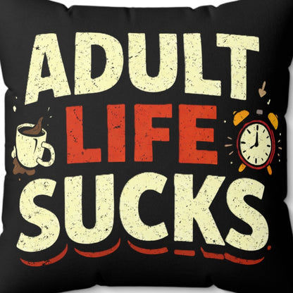 Black pillow with colorful text 'ADULT LIFE SUCKS' on a white background