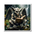 Spice up your fridge (or metal surfaces) with our Reading Gargoyle Magnet. This little guy loves books and is perfect for holding up important notes or reminders. A quirky addition to any home or office. 