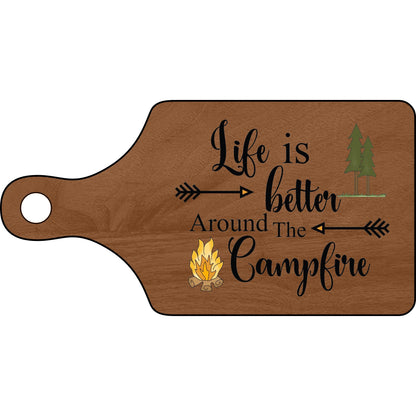 Wooden cutting board with 'Life is better around the campfire' text and graphics on a white background