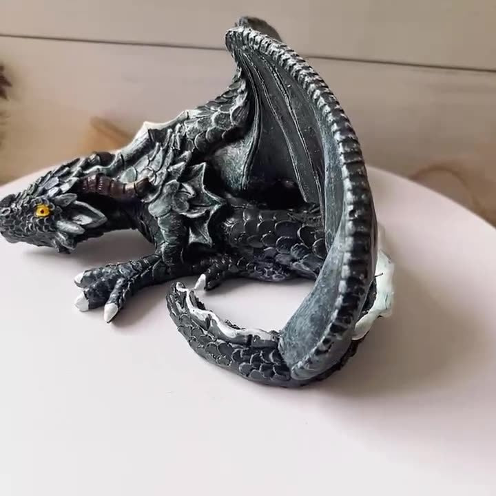 Transform your workspace into a realm of fantasy and wonder with our Winged Dragon Desktop Sculpture. Handcrafted with intricate details, this mythical creature adds a touch of magic to your surroundings. Let your imagination take flight with this inspiring and unique piece!