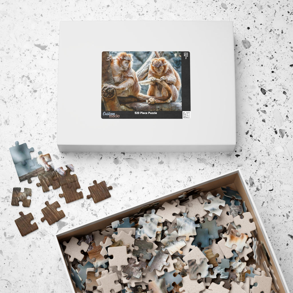 Get ready for endless fun with the Two Adorable Monkeys Puzzle! Featuring two playful monkeys in a stunning 110 to 1014 piece puzzle, this quirky and humorous puzzle is perfect for anyone who doesn't take themselves too seriously. With unique word play, double meanings, and a playful tone, this puzzle is sure to provide hours of entertainment.