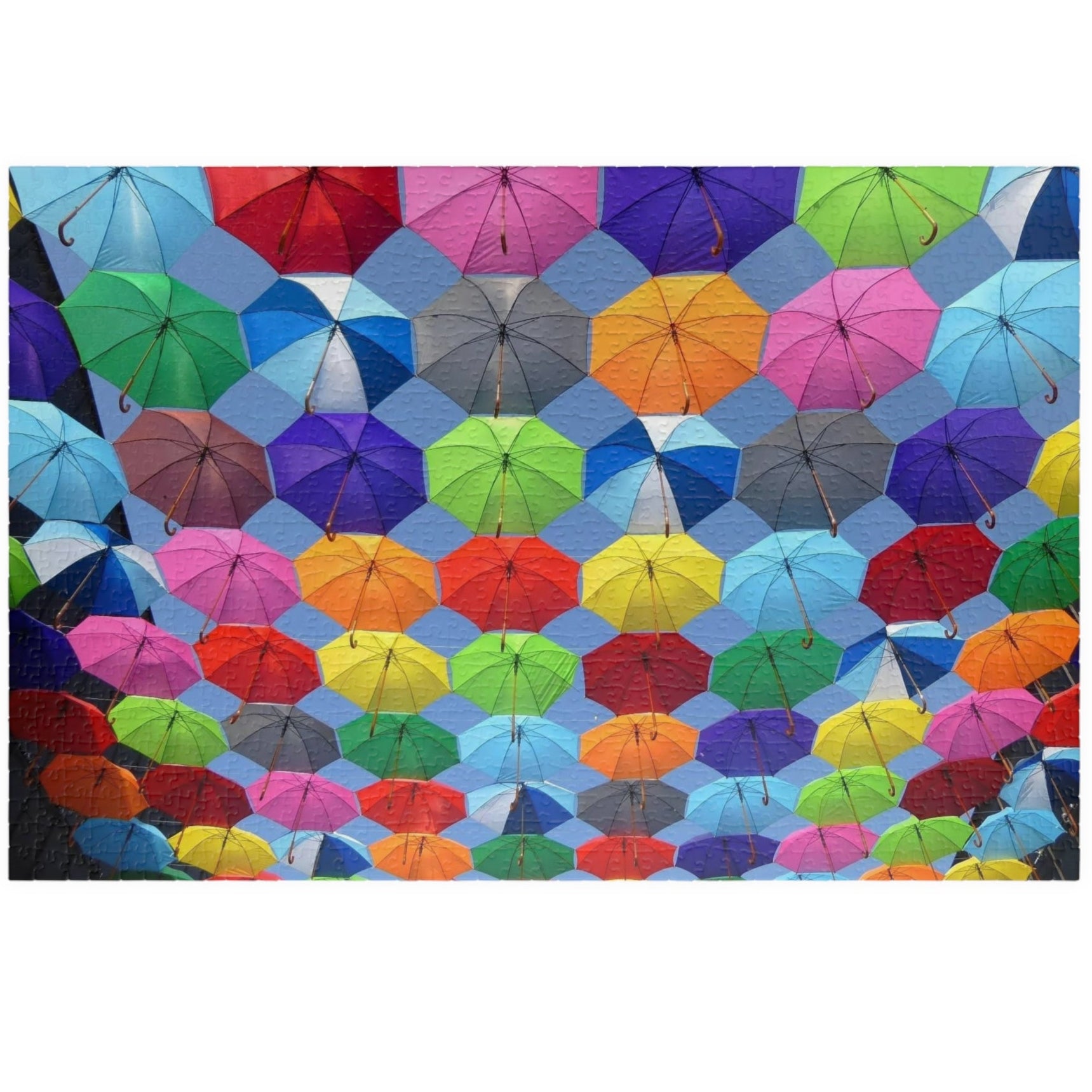 Piece together fun on rainy days with our quirky Colorful Umbrella's Puzzle! With 110 to 1014 pieces, this puzzle will keep you entertained for hours. Perfect for all ages, this colorful puzzle makes for a great addition to your rainy day activities.