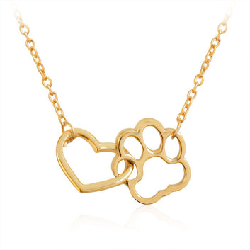 Capture the love and loyalty of your furry friend with our Heart Cat or Dog Footprint Necklace. This beautiful necklace features a heart pendant with a delicate paw print design, reminding you of the unconditional love and companionship of your pet. Show off your love with this unique accessory!