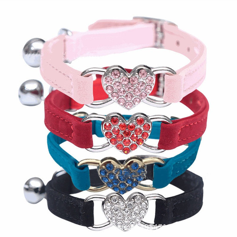 Elevate your furry friend's style with our Medium Crystal Heart Pet Collar with Bell! The sparkling crystal heart adds a touch of elegance while the bell ensures their safety. Give your pet the best of both worlds - fashion and functionality.