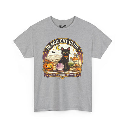 A heather gray short-sleeve t-shirt with a detailed graphic on the front. The graphic features a black cat sitting in front of a circular emblem that reads 'BLACK CAT CLUB' with 'MAGIC • SPIRITS • FORTUNE' below, surrounded by Halloween elements like a pumpkin, potion bottle, and crystal ball.