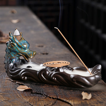 Experience the captivating aroma of burning incense with this stunning Ceramic Backflow Aromatherapy Dragon Incense Burner. Crafted from high-quality ceramic and featuring a majestic dragon design, this incense burner is the perfect way to enhance the atmosphere in any room. 