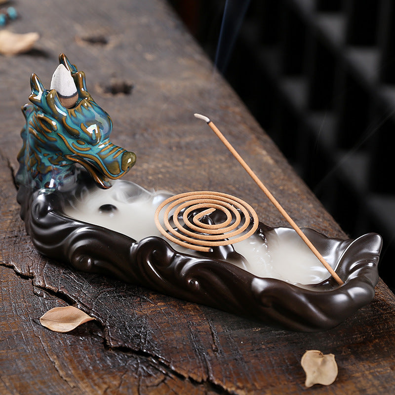 Experience the captivating aroma of burning incense with this stunning Ceramic Backflow Aromatherapy Dragon Incense Burner. Crafted from high-quality ceramic and featuring a majestic dragon design, this incense burner is the perfect way to enhance the atmosphere in any room. 