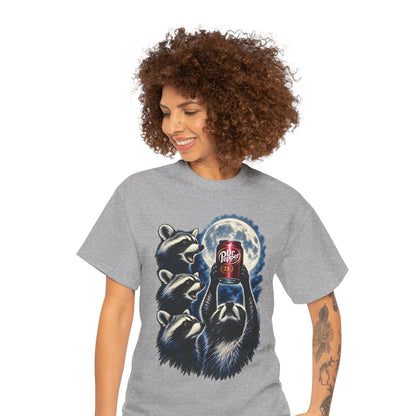 A woman with curly brown hair wearing a heather gray t-shirt with a graphic of raccoons and a bear under a full moon, paired with blue jeans, against a plain white background.