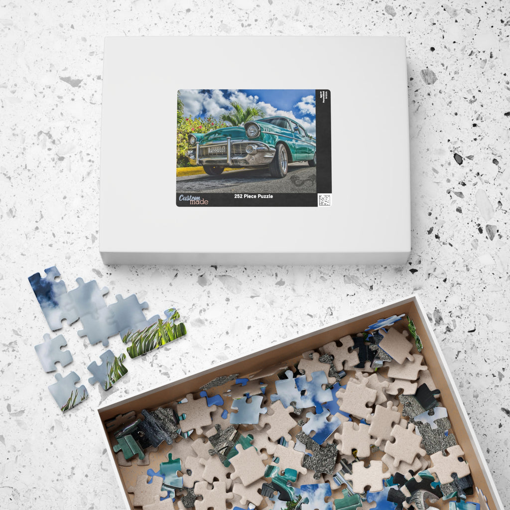 Indulge in a sophisticated puzzle experience with our Blue Classic Car Puzzle. Unleash your inner artist and immerse yourself in the world of vintage luxury. With 110 to 1014 pieces, this puzzle will challenge and delight, providing hours of elegant entertainment.