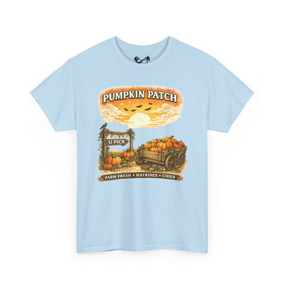 A light blue short-sleeve crewneck t-shirt featuring a vintage-style autumn graphic on the front with pumpkins, a wagon, and the text 'PUMPKIN PATCH' and 'FARM FRESH & MARYLAND CIDER'.