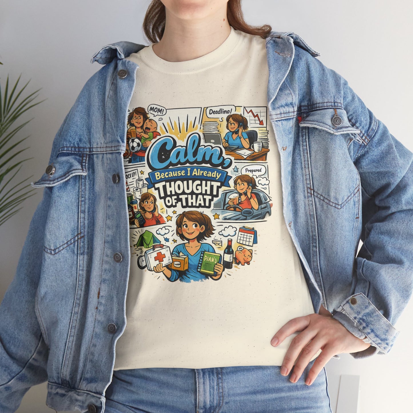 Person wearing a t-shirt with a graphic design and denim jacket