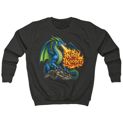 A black crewneck sweatshirt featuring a colorful graphic of a blue dragon with green wings breathing fire, with the text 'King Kooper' in orange flames, displayed on a solid white background.