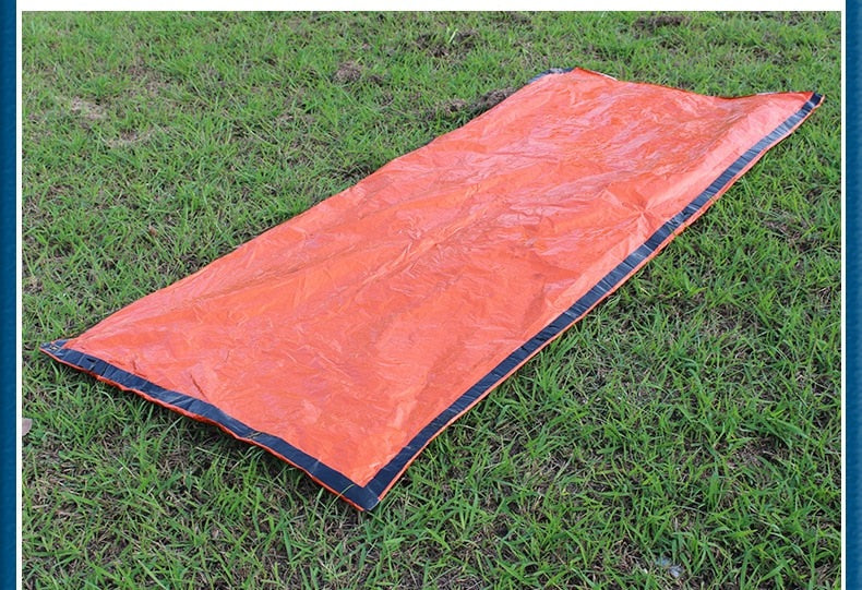Keep yourself safe and dry in any situation with this emergency reusable waterproof sleeping bag! No matter the weather, you can trust that this bag will provide you with the protection you need, giving you peace of mind. A must-have for any outdoor adventure!