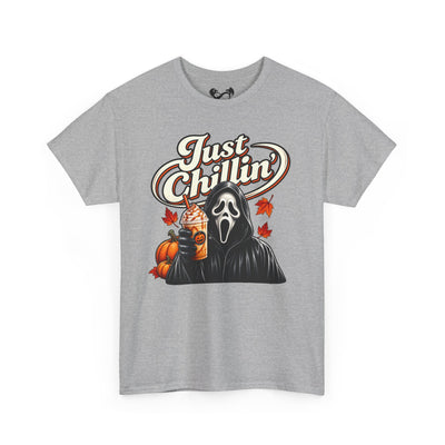 A heather gray short-sleeve t-shirt with a graphic print of Ghostface from Scream holding an iced coffee with pumpkins and autumn leaves, under the text 'Just Chillin''.