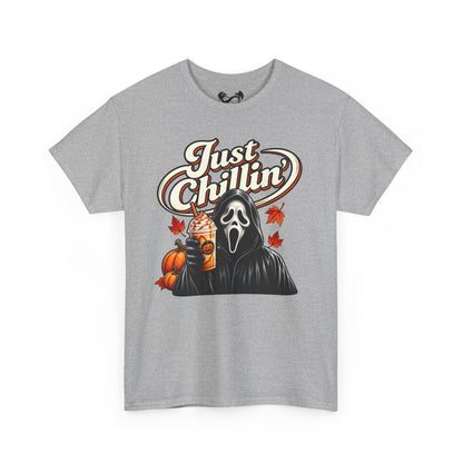 A heather gray short-sleeve t-shirt with a graphic print of Ghostface from Scream holding an iced coffee with pumpkins and autumn leaves, under the text 'Just Chillin''.