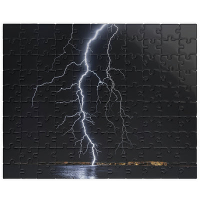 Experience the awe-inspiring beauty of nature with our Lightening Strikes Water Puzzle. This 110 to 1014 piece puzzle features a striking image of a lightning storm over a serene body of water. Challenge your mind and calm your soul with this captivating puzzle.