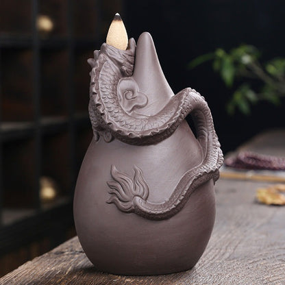 Upgrade your home decor with our Creative Dragon Backflow Incense Burner! Featuring a unique design, it not only adds a touch of elegance to any room but also creates a relaxing and soothing atmosphere with its backflow incense effect. Perfect for those looking for a calming and stylish addition to their space.