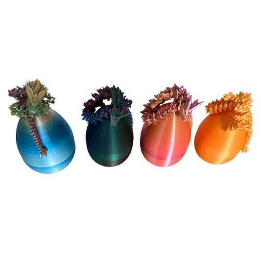 Discover the magic of this 3D Printed Moveable Dragon in Egg, a unique collectible that combines intricate design with fascinating movement. Crafted with precision, this dragon springs to life within its egg, making it a captivating display piece. 