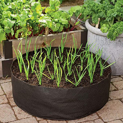 Grow your garden with ease using our Fabric Gardening Grow Planter! This innovative planter is made of durable fabric, allowing for optimal water flow and root ventilation. Plus, its lightweight and portable design makes it perfect for any gardening enthusiast.