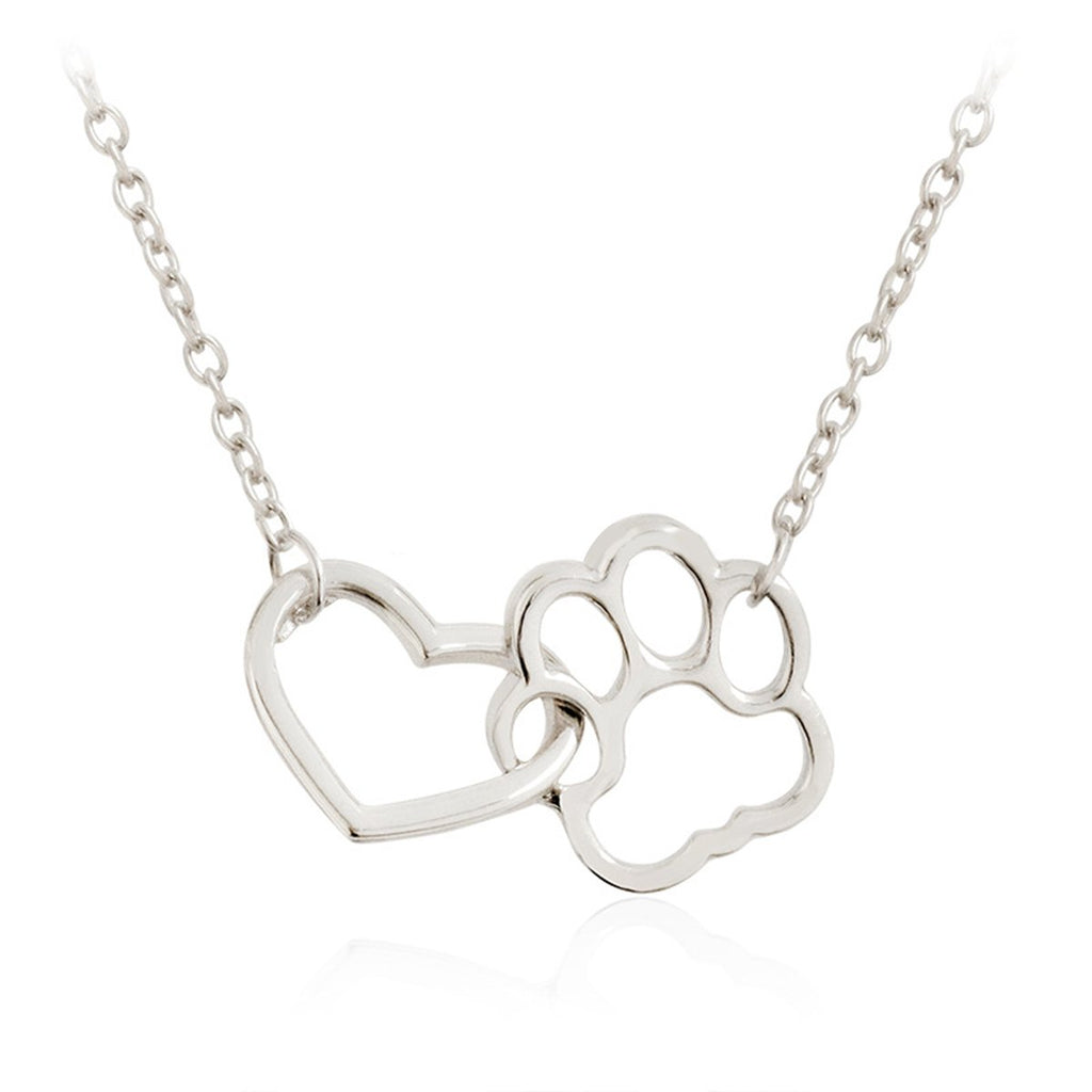 Capture the love and loyalty of your furry friend with our Heart Cat or Dog Footprint Necklace. This beautiful necklace features a heart pendant with a delicate paw print design, reminding you of the unconditional love and companionship of your pet. Show off your love with this unique accessory!
