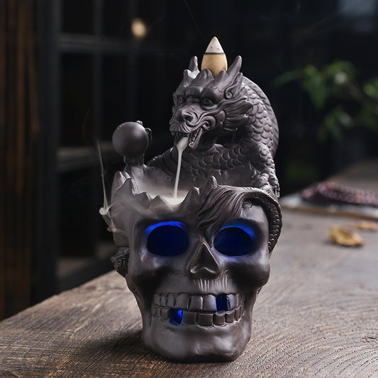 Elevate your space with the Aromatherapy Skull Dragon Backflow Incense Burner. This striking piece combines dramatic skull and dragon motifs to create a captivating focal point.