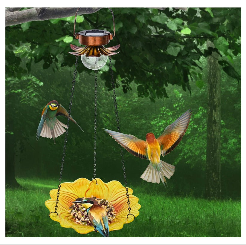 Bring joy and beauty to your backyard with our Solar Hanging Sunflower Bird Feeder! The stunning design of sunflower petals and the solar-powered LED light will attract birds while providing sustainable energy. Enjoy the peaceful sound of singing birds and help the environment at the same time!