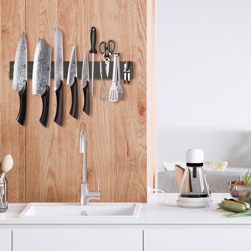 Keep your kitchen organized and your knives within arm's reach with this powerful magnetic wall mount knife strip. Engineered with industrial-strength magnets, it securely holds knives of various sizes while protecting blade edges from damage.