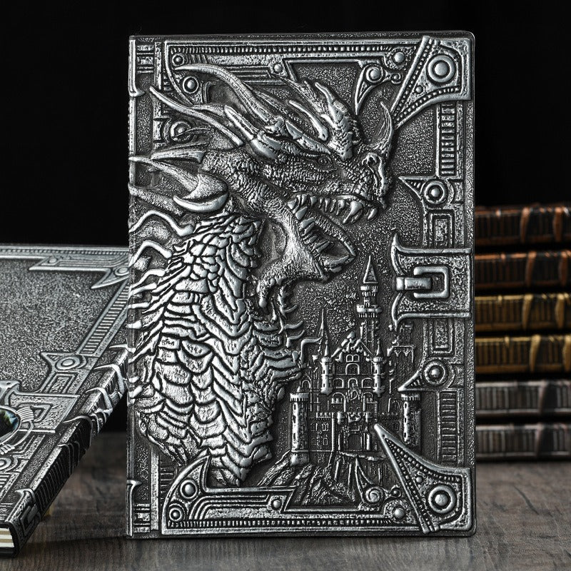 Retro Embossed Metal 3-D Dragon Notebook is the perfect accessory for those who desire a luxurious writing companion. Crafted with intricate embossed metal, this notebook will add an exclusive touch to your stationery collection. Capture your thoughts and ideas in style with this exquisite dragon notebook.
