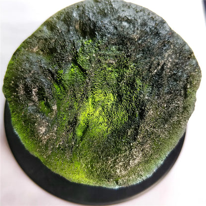 Discover the natural healing powers of the Rare Green Moldavite Crystal. Sourced from the Czech Republic, this crystal is known to relieve stress and anxiety while promoting emotional balance and spiritual growth. Add this unique crystal to your collection for its powerful benefits.