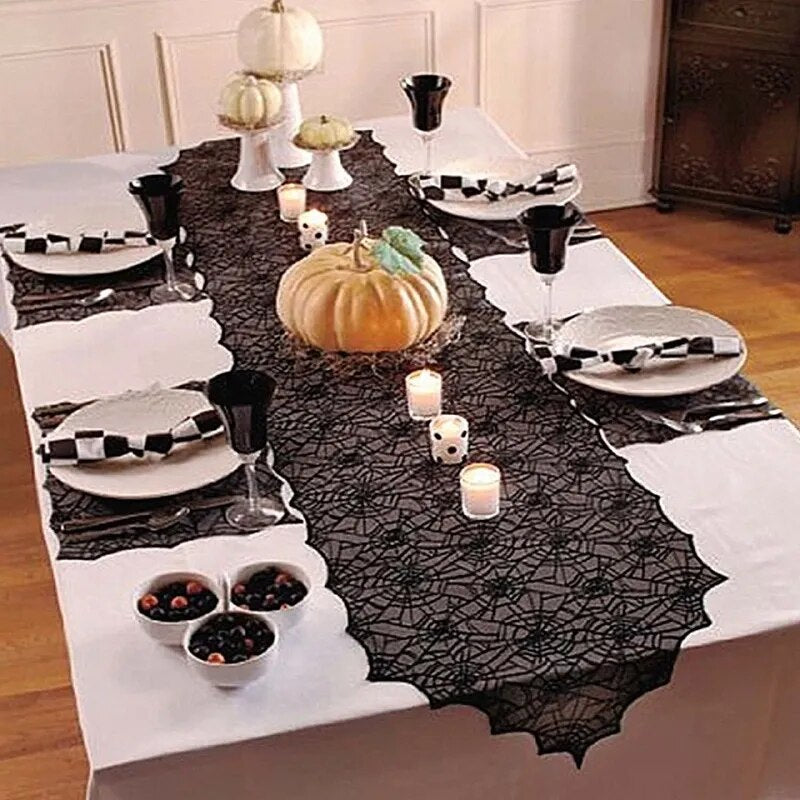 Show your spooky style with this mysterious Black Lace Spider Web Tablecloth. Its intricate black lace web pattern will bring a unique touch of sophistication to your Halloween decor and is perfect for creating an eerie atmosphere! Unleash your inner boldness and challenge your guests with the unexpected.