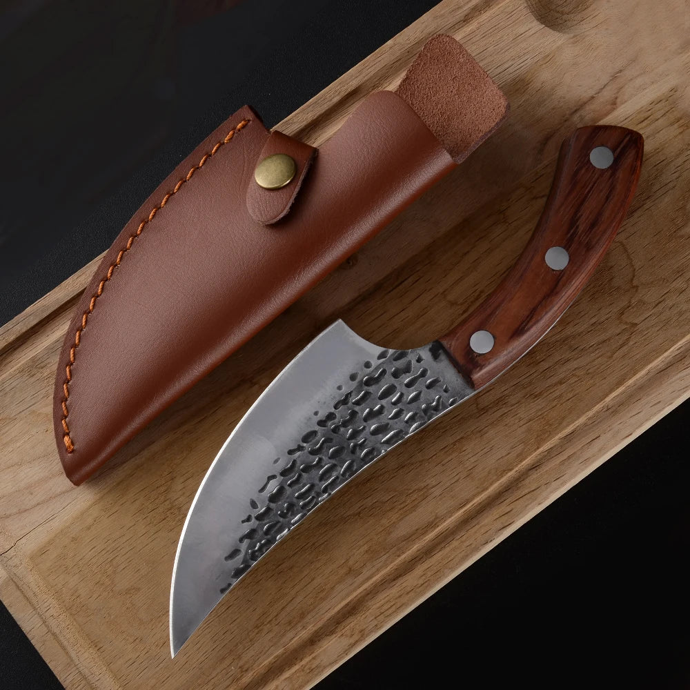 This handcrafted cleaver combines traditional blacksmithing with modern metallurgy. The fortified steel blade, measuring 5.5 inches, delivers exceptional edge retention and durability for precise butchering tasks.