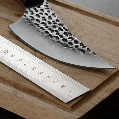 This handcrafted cleaver combines traditional blacksmithing with modern metallurgy. The fortified steel blade, measuring 5.5 inches, delivers exceptional edge retention and durability for precise butchering tasks.