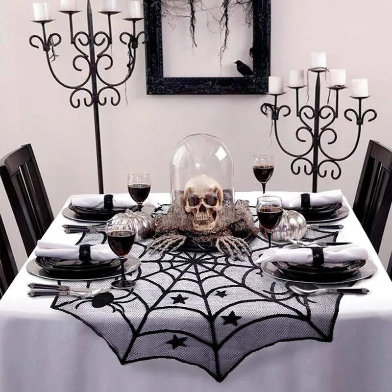 Show your spooky style with this mysterious Black Lace Spider Web Tablecloth. Its intricate black lace web pattern will bring a unique touch of sophistication to your Halloween decor and is perfect for creating an eerie atmosphere! Unleash your inner boldness and challenge your guests with the unexpected.