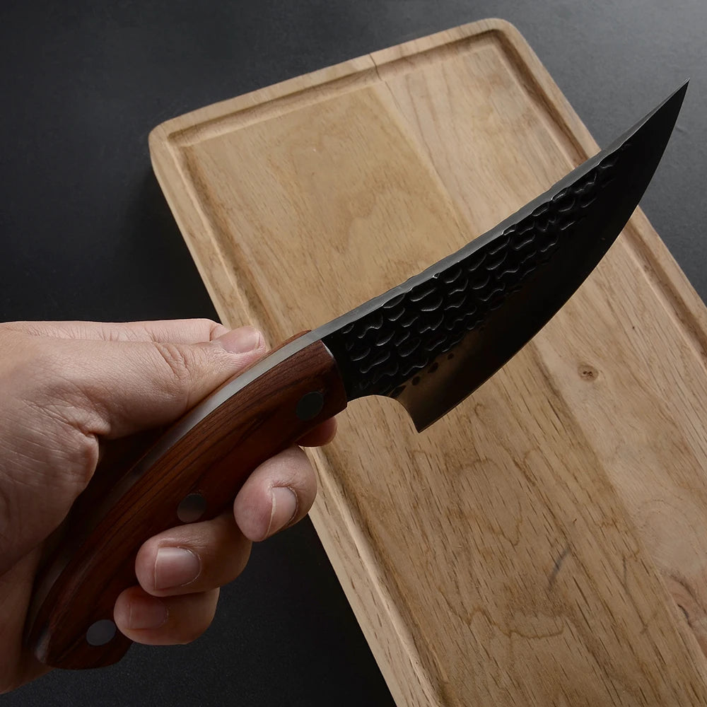 This handcrafted cleaver combines traditional blacksmithing with modern metallurgy. The fortified steel blade, measuring 5.5 inches, delivers exceptional edge retention and durability for precise butchering tasks.
