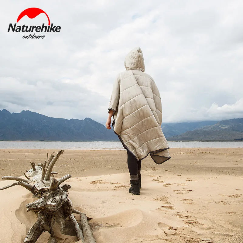 Stay warm and dry on your next adventure with our Sleeping Bag Waterproof Warm Travel Poncho! This versatile poncho not only provides waterproof protection, but also converts into a cozy sleeping bag for a comfortable night's sleep. 