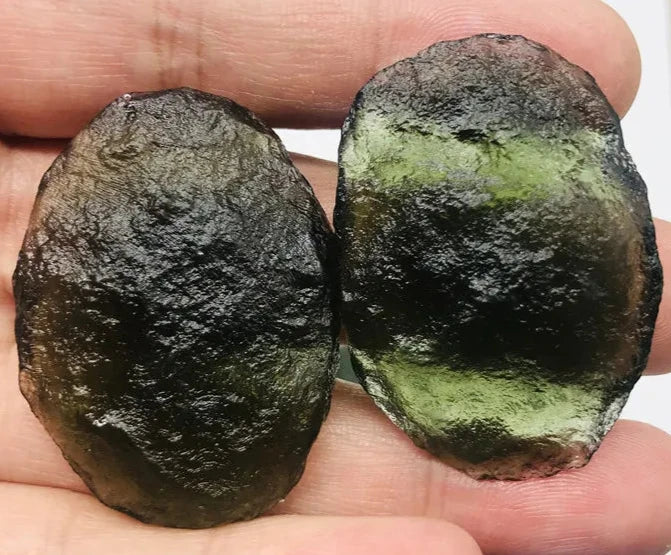 Discover the beauty and energy of our 1PC Raw Natural Rough Cut Green Moldavite. Crafted from the finest quality, this gem is believed to have healing and transformative powers. Add this unique piece to your collection and experience its natural, raw beauty. Perfect for any mineral enthusiast.