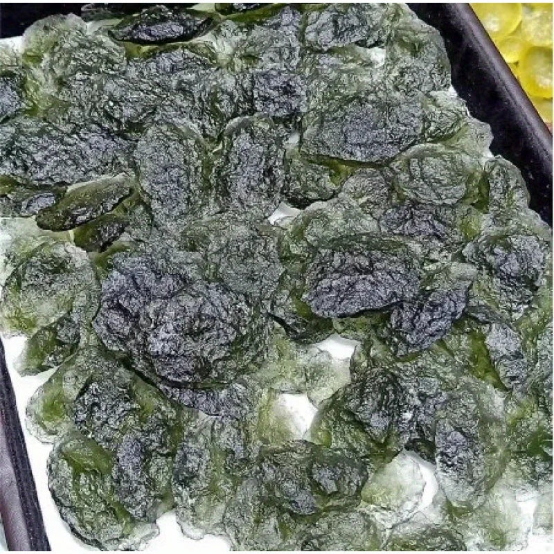 Enhance your meditation practice with our Irregular Moldavite Healing Stones. Crafted by nature, these stones offer unique and powerful energy that can help bring balance and focus to your mind. Connect with the healing properties of these sacred stones and elevate your meditation experience.