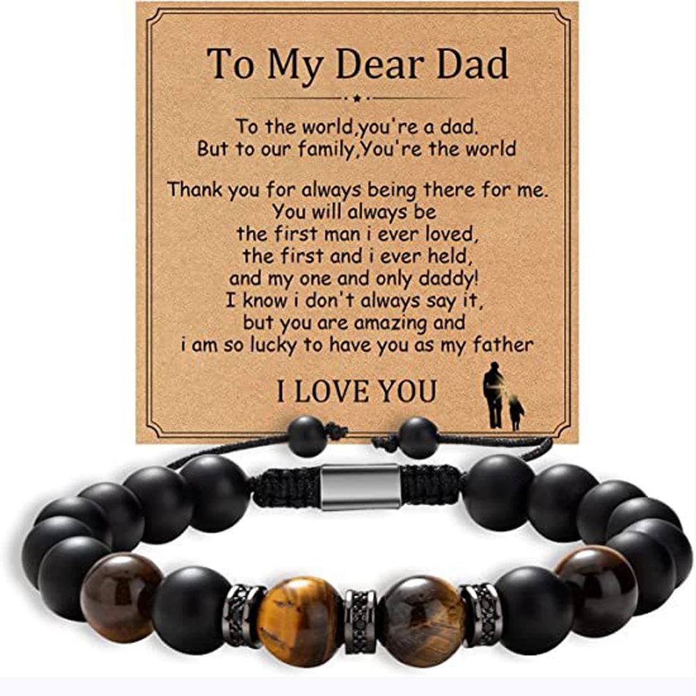 Black beaded bracelet with a sentimental message card for a father on a white background