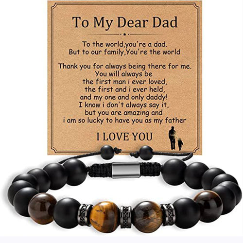 Black beaded bracelet with a sentimental message card for a father on a white background
