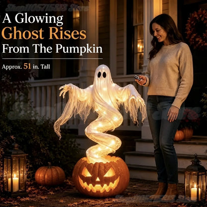 A glowing ghost Halloween decoration rising from a carved pumpkin on a porch, with a woman standing beside it holding a phone. Text on the image reads 'A Glowing Ghost Rises From The Pumpkin' and 'Approx.