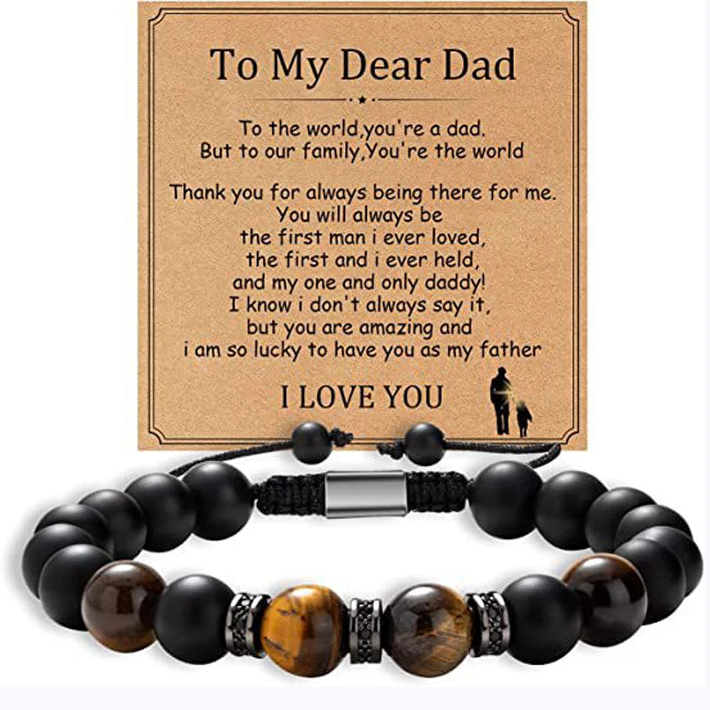 Black beaded bracelet with a sentimental message card for a father on a white background
