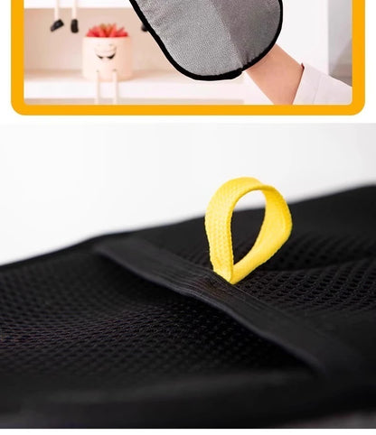 Yellow hair tie on a black car seat with a close-up inset of a person using a hair dryer.