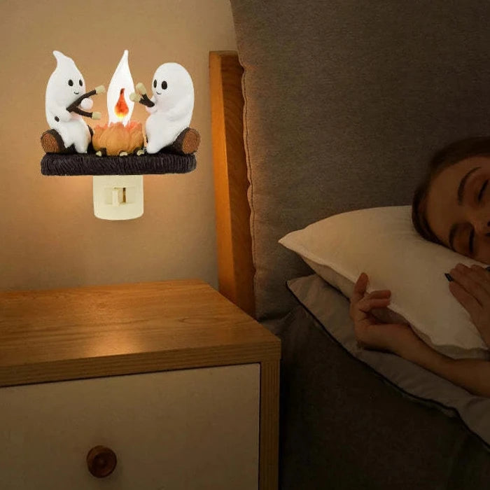 lluminate your home with the eerie but charming Ghost Flickering Campfire Night Light. With its flickering light and ghostly design, this night light creates a spooky yet cozy atmosphere.