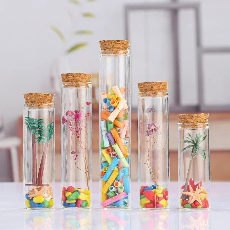 Introduce a touch of elegance and sophistication to your craft with our set of 5 clear straight glass bottles. Perfect for witch crafting and creating special potions, these bottles come with equally charming corks, making them both functional and visually appealing. Elevate your craft with these unique and exclusive bottles.