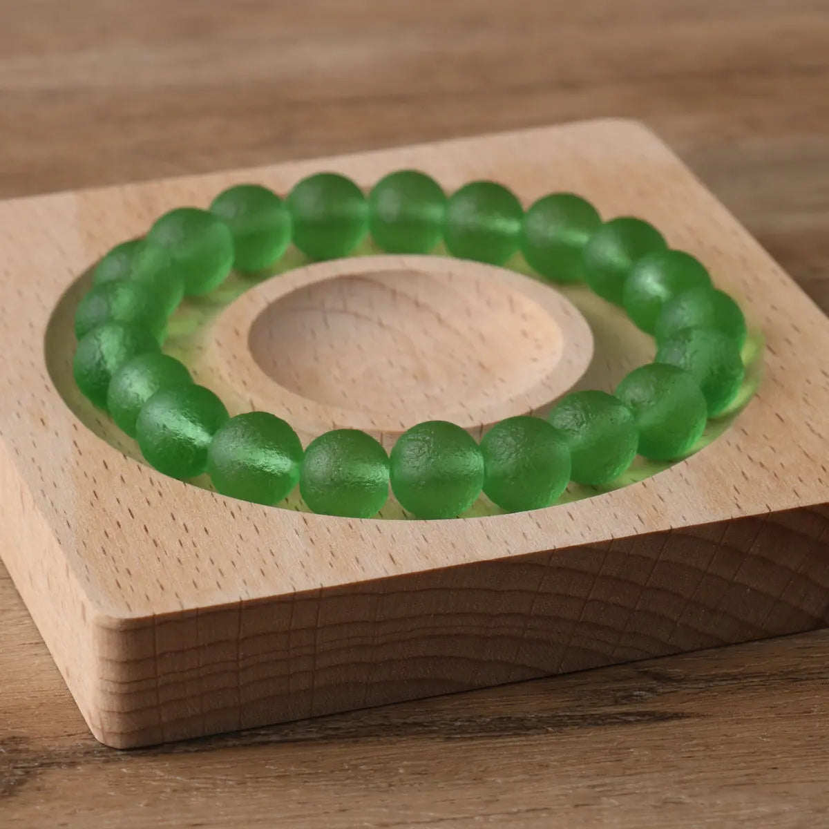 Experience the natural healing power of 10mm Moldavite crystal beads with our handmade beaded bracelets. Formed from a meteorite impact, these bracelets are believed to bring balance, protection, and spiritual growth. Wear them for daily wellness or meditation. Available now!