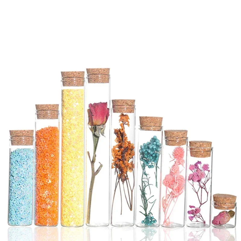 Introduce a touch of elegance and sophistication to your craft with our set of 5 clear straight glass bottles. Perfect for witch crafting and creating special potions, these bottles come with equally charming corks, making them both functional and visually appealing. Elevate your craft with these unique and exclusive bottles.