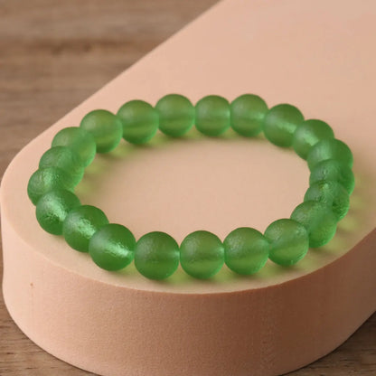 Experience the natural healing power of 10mm Moldavite crystal beads with our handmade beaded bracelets. Formed from a meteorite impact, these bracelets are believed to bring balance, protection, and spiritual growth. Wear them for daily wellness or meditation. Available now!